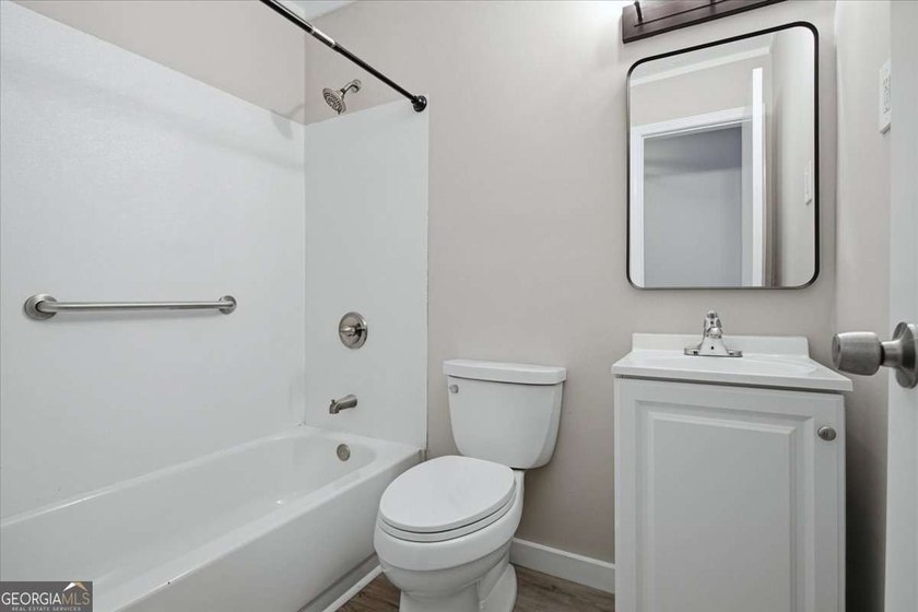 Beautifully renovated, 4 sided brick ranch on nearly 1/2 acre - photo 11