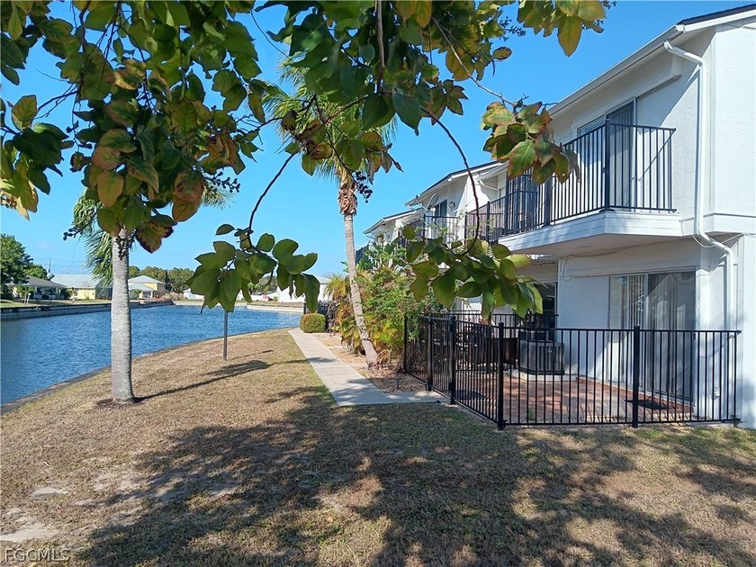 Enjoy pristine canal views from this beautifully situated - photo 3