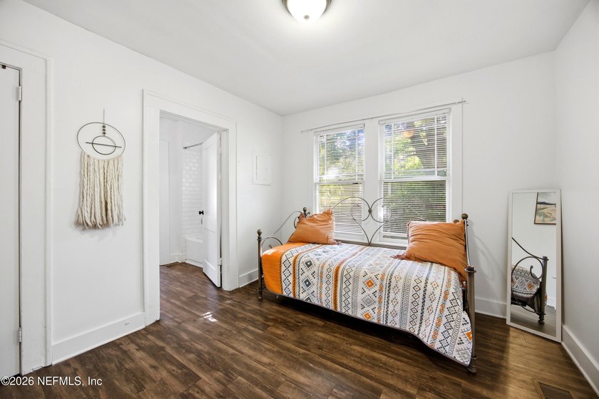 Fully Occupied, beautifully renovated Riverside duplex in an - photo 11