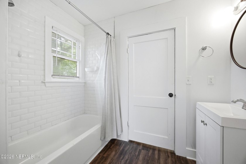 Fully Occupied, beautifully renovated Riverside duplex in an - photo 14