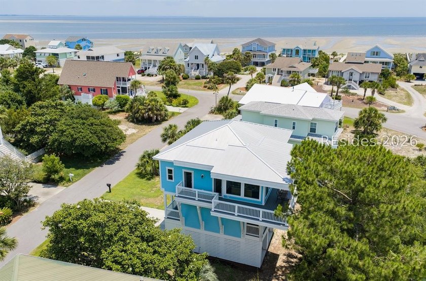 Welcome to 5 Tradewind Lane, a stunning coastal retreat in the - photo 7