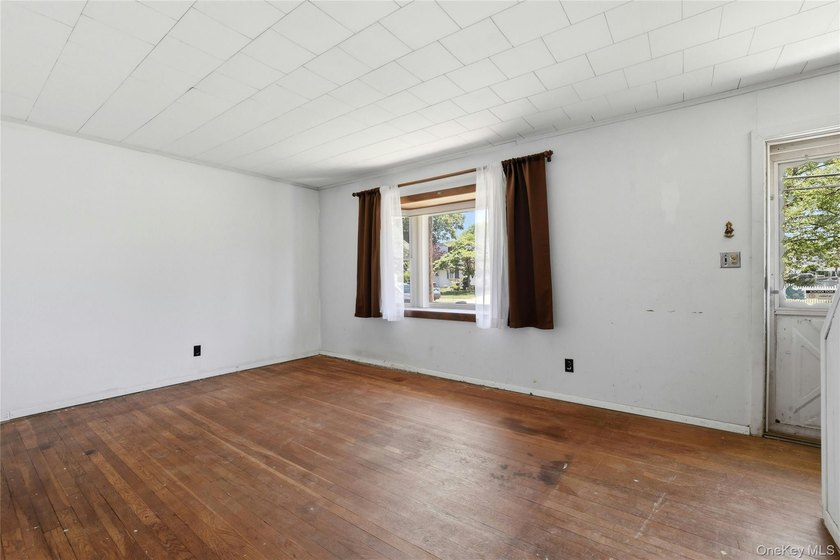 Welcome To This Spacious 4-Bedroom, 2-Bath Home In Merrick - photo 4