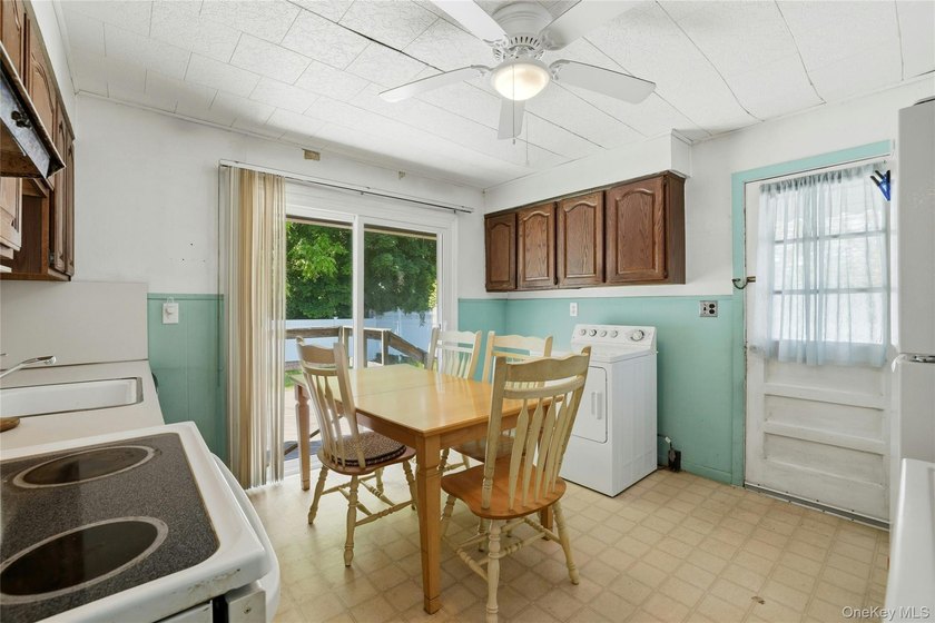 Welcome To This Spacious 4-Bedroom, 2-Bath Home In Merrick - photo 7