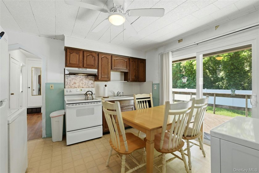 Welcome To This Spacious 4-Bedroom, 2-Bath Home In Merrick - photo 9