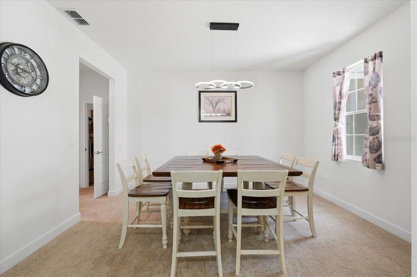 Discover elevated living behind the gates of Lake Ariana Estates - photo 18