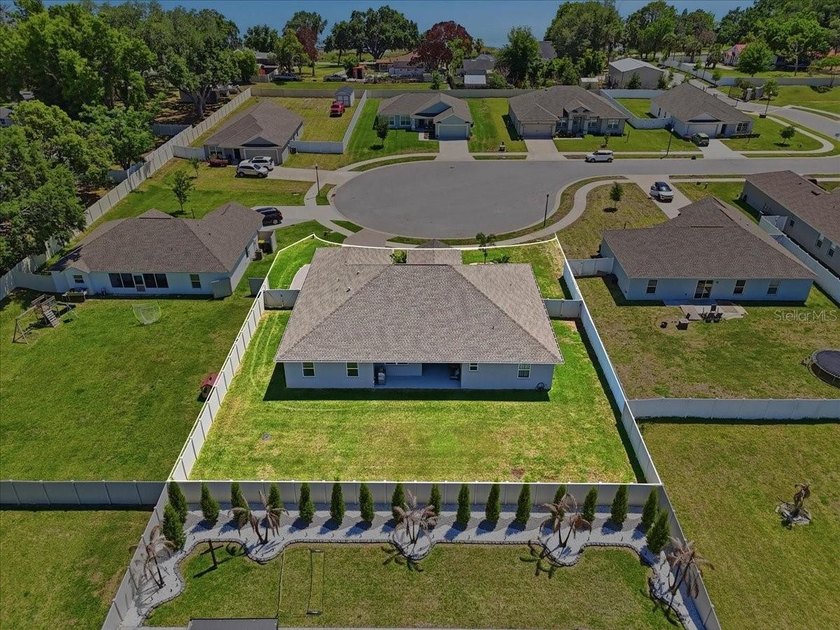 Discover elevated living behind the gates of Lake Ariana Estates - photo 46