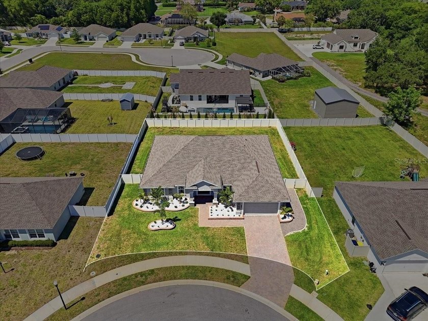 Discover elevated living behind the gates of Lake Ariana Estates - photo 47