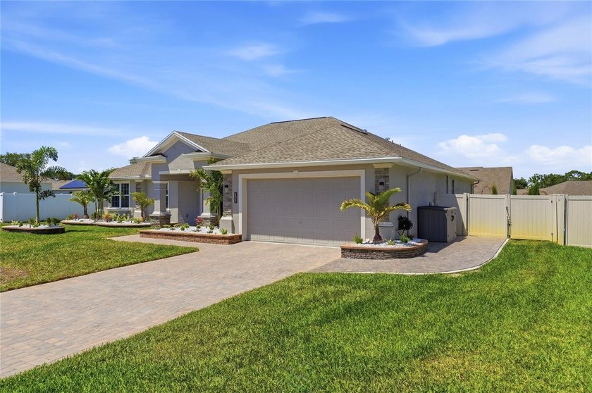 Discover elevated living behind the gates of Lake Ariana Estates - photo 49