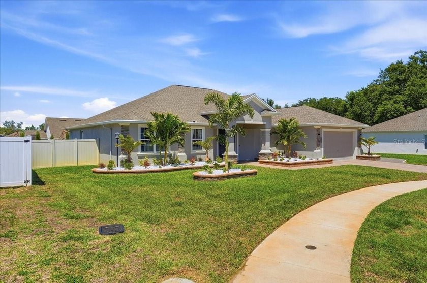 Discover elevated living behind the gates of Lake Ariana Estates - photo 50