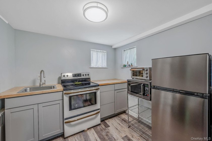 Welcome to this charming single-family split ranch nestled in a - photo 17