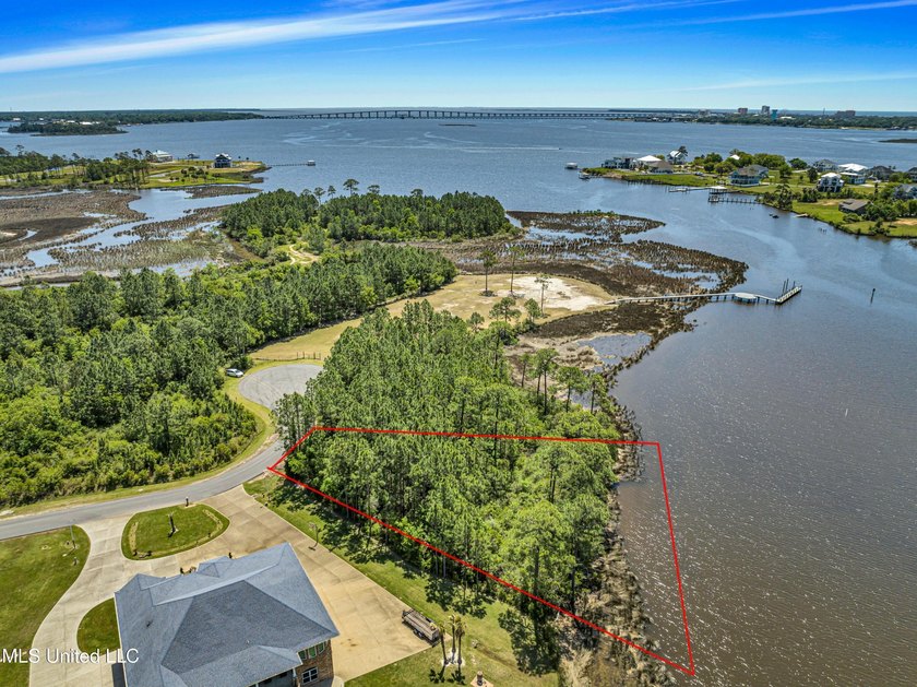 Build your waterfront dream on this .86-acre unimproved lot on - photo 3