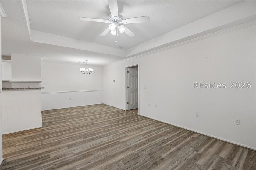 Enjoy wooded views from this second-floor condominium in The - photo 4