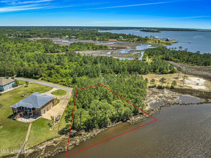 Build your waterfront dream on this .86-acre unimproved lot on - photo 4