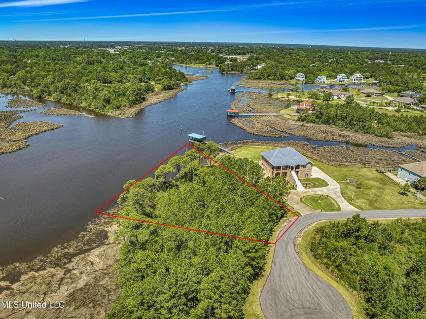 Build your waterfront dream on this .86-acre unimproved lot on - photo 7