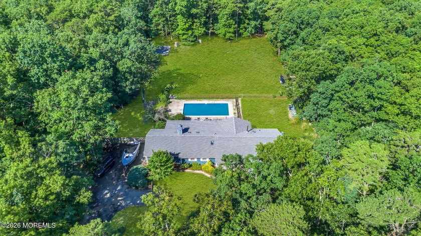 Set back on Whitesville Road directly across Walden Woods, this - photo 40