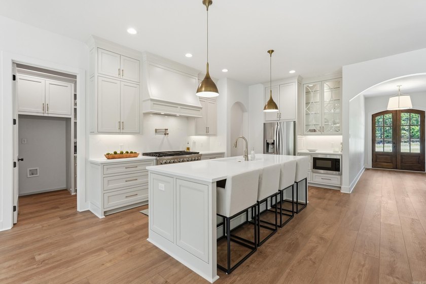 Nestled on a beautifully private homesite in the highly - photo 11