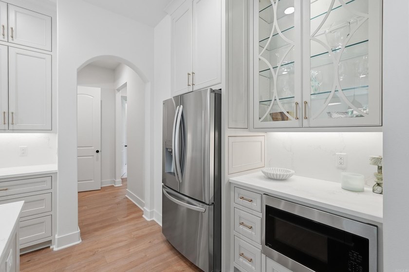 Nestled on a beautifully private homesite in the highly - photo 12