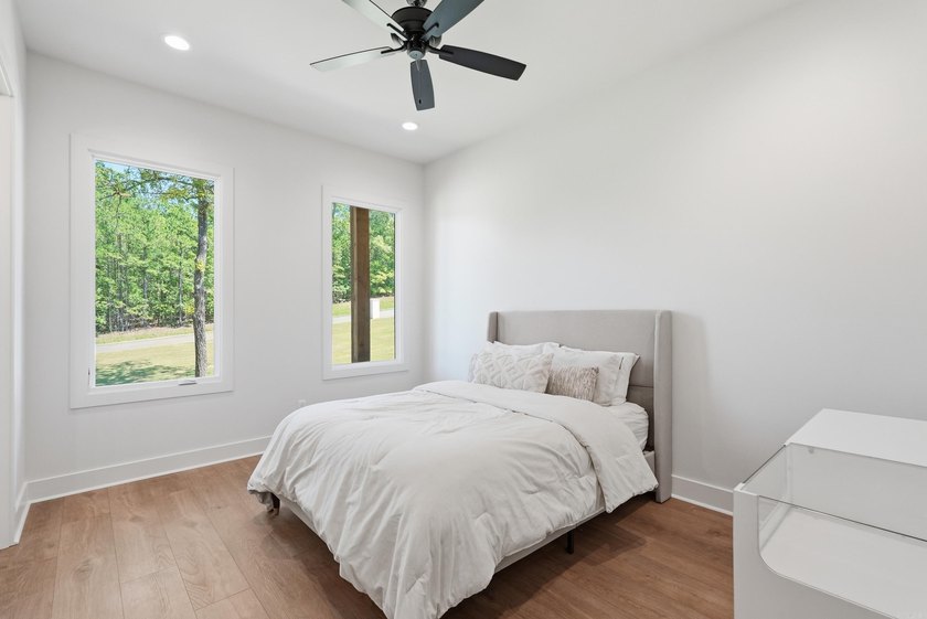 Nestled on a beautifully private homesite in the highly - photo 28