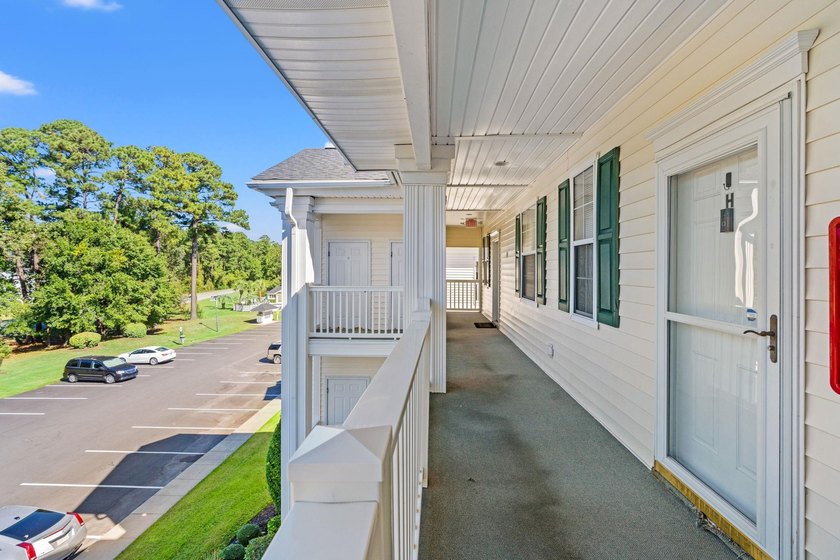 Your coastal top-floor retreat awaits, just 4 miles from the - photo 4