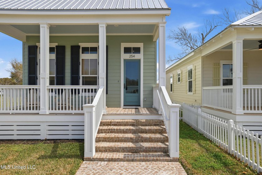 Discover one of the first two beautifully completed homes in the - photo 4