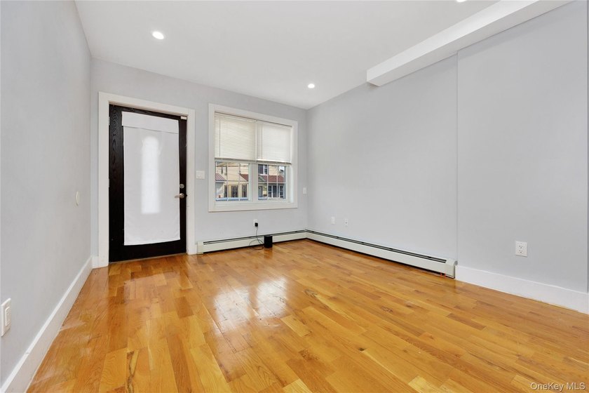Built in 2021, this legal two-family brick duplex offers a rare - photo 3