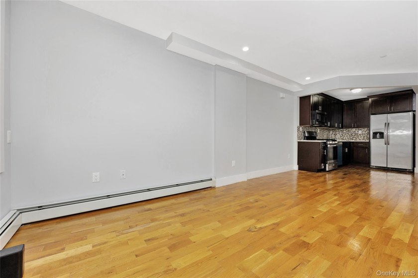 Built in 2021, this legal two-family brick duplex offers a rare - photo 4