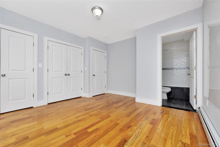 Built in 2021, this legal two-family brick duplex offers a rare - photo 10