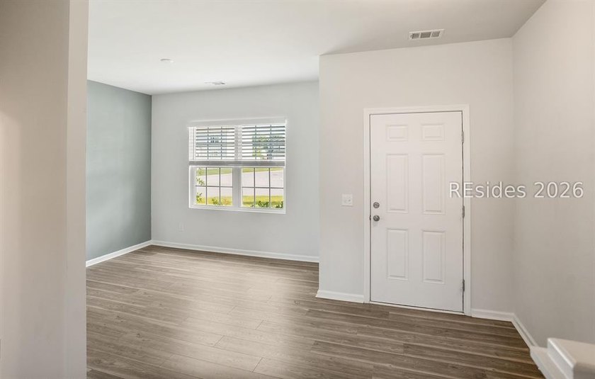 Welcome to 1 Toxaway Lane, where modern comfort meets Lowcountry - photo 6