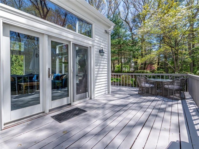 A circular driveway welcomes you to this elegant Colonial set on - photo 6