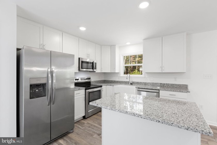 The Monroe Model by Hamlet Homes in the highly sought after - photo 4