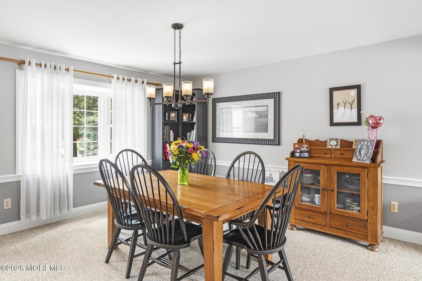 Stunning Colonial set on a beautifully landscaped property with - photo 8