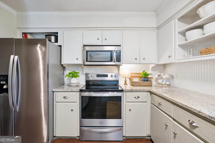 Welcome home to this charming 3-bedroom, 2-bath cottage-style - photo 13