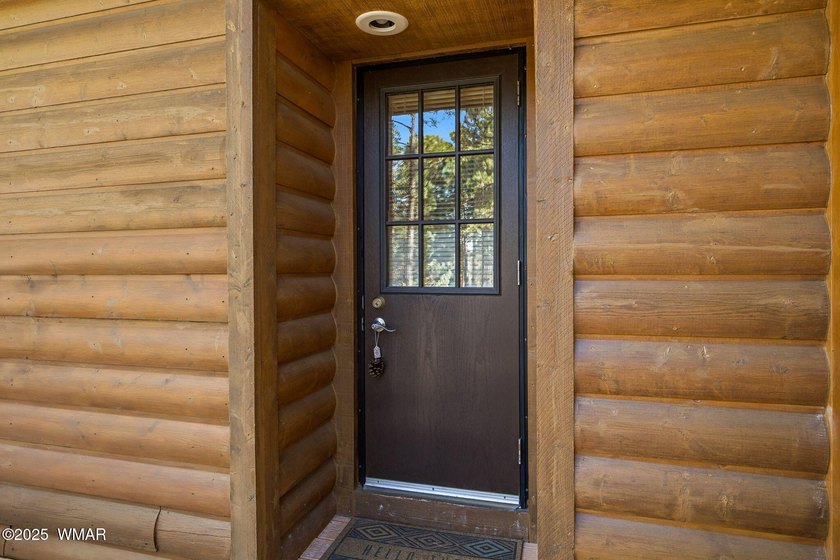 Nestled on a premium, private lot surrounded by towering pines - photo 12