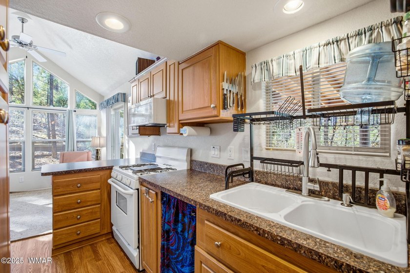 Nestled on a premium, private lot surrounded by towering pines - photo 18