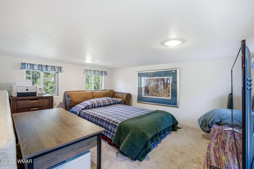 Nestled on a premium, private lot surrounded by towering pines - photo 23