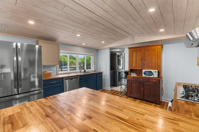 Welcome home to this charming, fully updated lake retreat on - photo 11