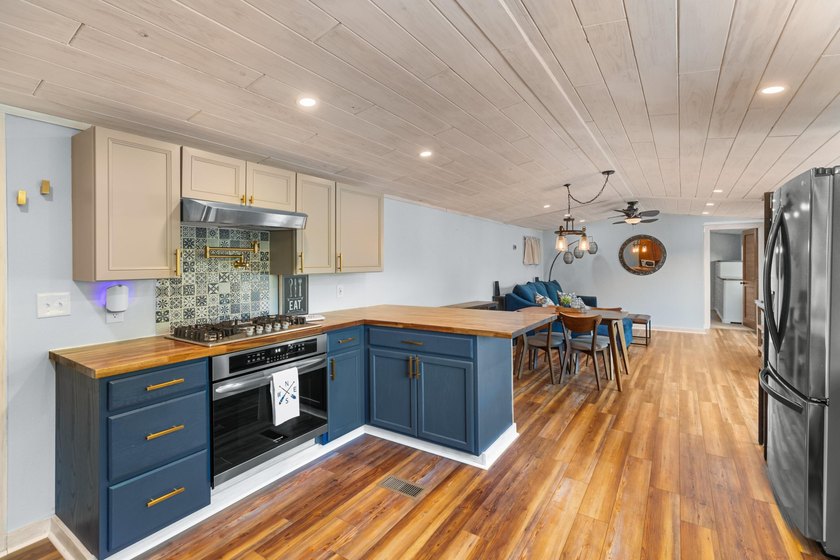 Welcome home to this charming, fully updated lake retreat on - photo 12