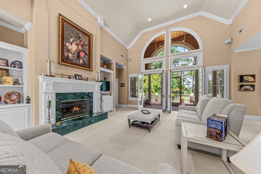 Nestled on 1.50 beautifully landscaped acres in the sought-after - photo 4