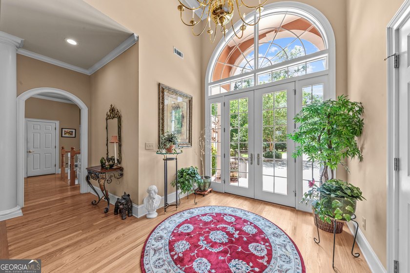 Nestled on 1.50 beautifully landscaped acres in the sought-after - photo 6