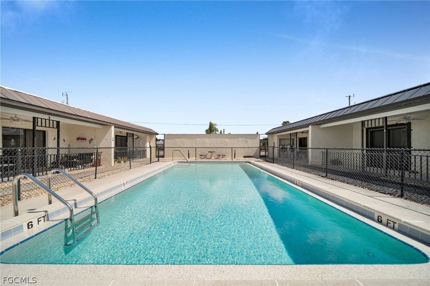 Discover this well-maintained end-unit condo offering comfort - photo 3
