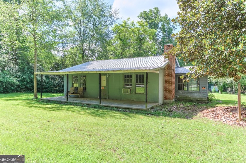 Zoned R-2, the property allows for one home per half-acre and - photo 9