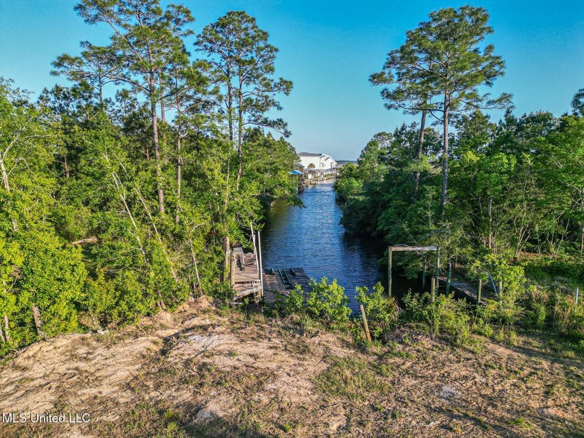 Waterfront living at its finest! This incredible lot on the - photo 2