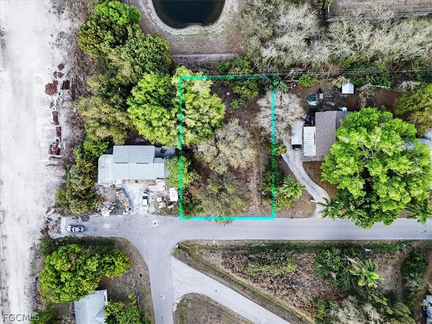 This 0.20-acre oversized residential lot is located in the - photo 3