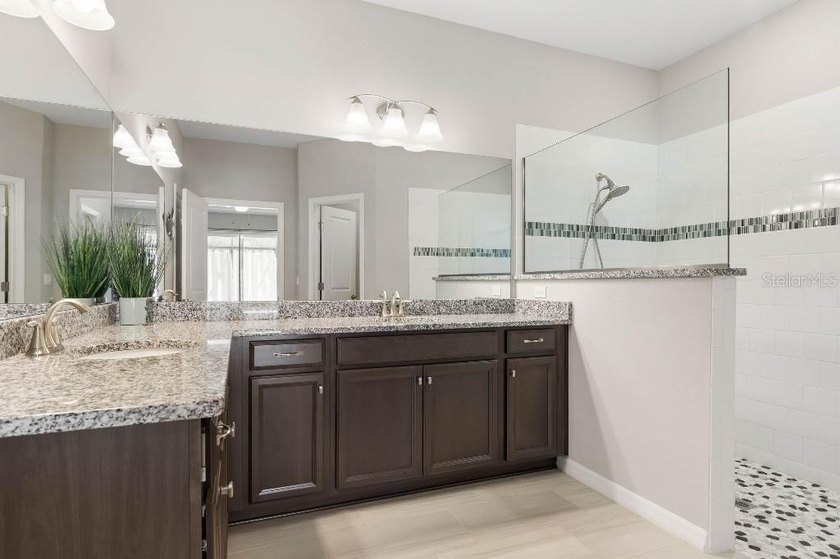 Built in 2022, this custom 4-bedroom, 3-bath home offers modern - photo 7