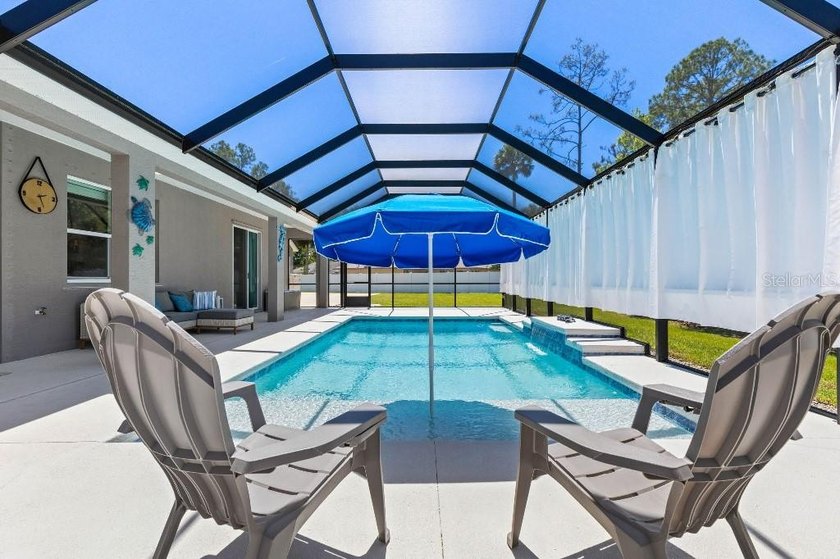 Built in 2022, this custom 4-bedroom, 3-bath home offers modern - photo 9
