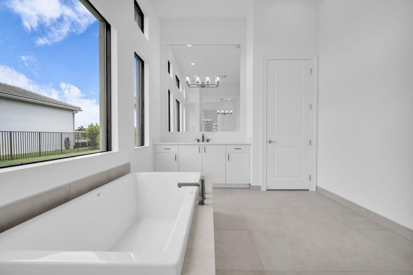 SPECTACULAR NEVER LIVED IN 3 BEDROOM 4 FULL BATHROOM SINGLE - photo 22