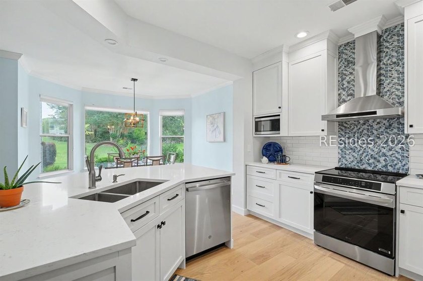 Completely reimagined and move-in ready, this stunning - photo 3