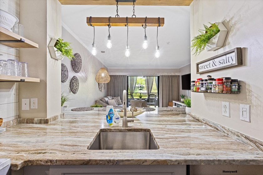 Welcome to this beautifully updated 1 bedroom, 1.5 bath condo - photo 3