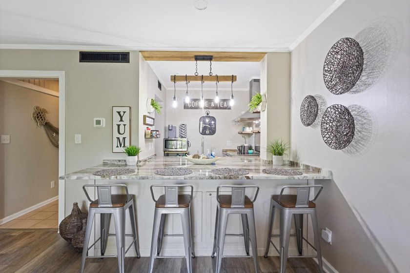 Welcome to this beautifully updated 1 bedroom, 1.5 bath condo - photo 4
