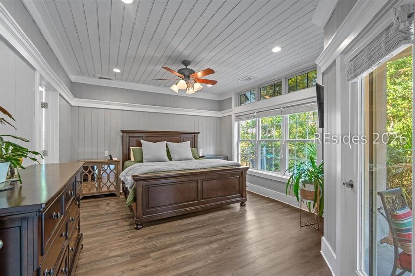 On a generous 0.63-acre corner lot in golf cart-friendly - photo 4